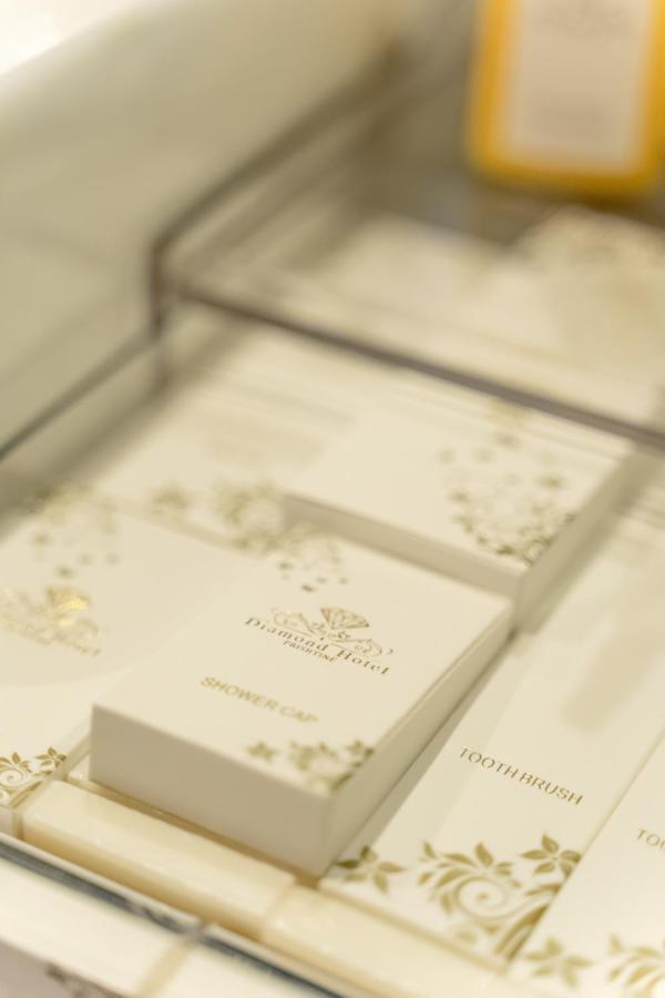 Hotel Diamond Prishtina Пристина Екстериор снимка A gold-embossed invitation