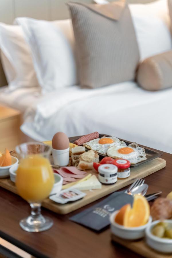 Hotel Diamond Prishtina Пристина Екстериор снимка A typical breakfast